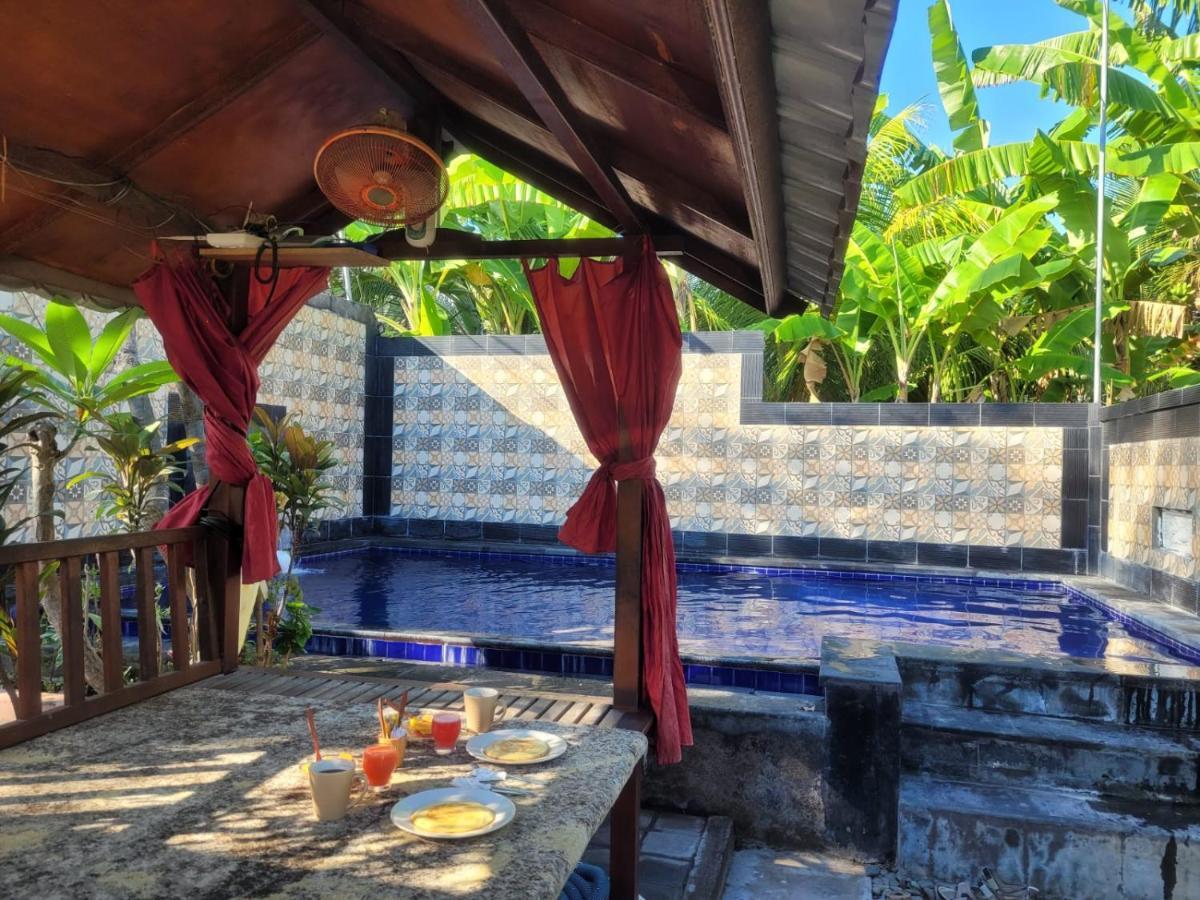 Putu Guest House Pemuteran Kültér fotó